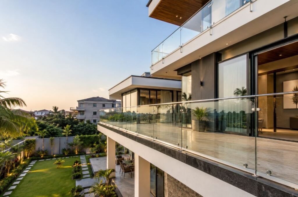 Luxury villa balcony featuring a modern glass railing design